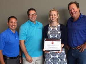 From Left to Right: Jason Nawrocki - Education Committee Chair, David Durstine - FAMA Board President and Sponsor Representative, Julie Bryant, and Tim Van Fleet - Sponsor Representative